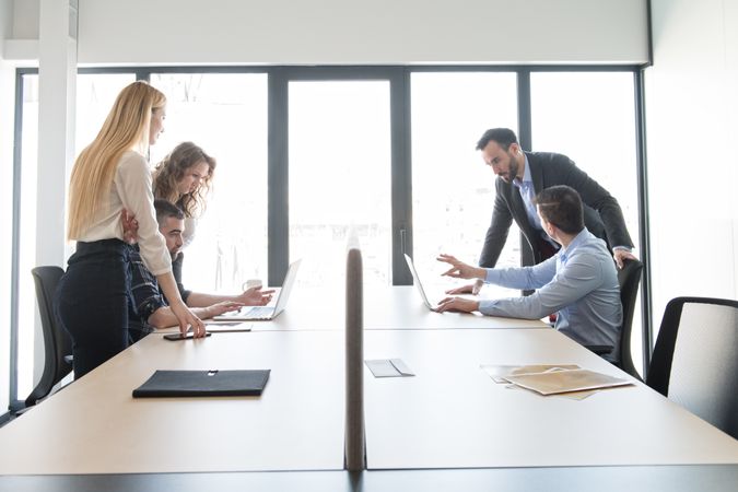 Group of colleagues working in contemporary office
