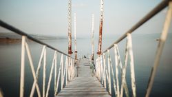 Rusty pier near calm sea