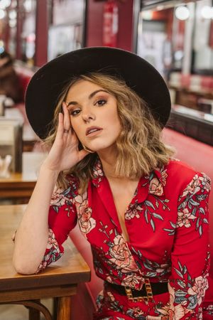 Elegant female sitting in cafe