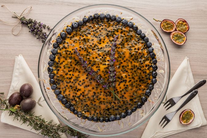 Tasty passion fruit pie decorated with blueberry