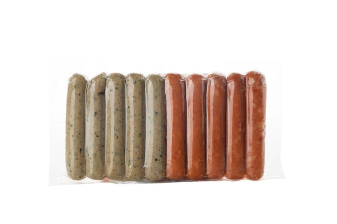 Packaged sausages in blank room