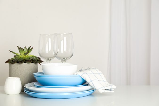 Cutlery with succulent plant stacked on table, space for text