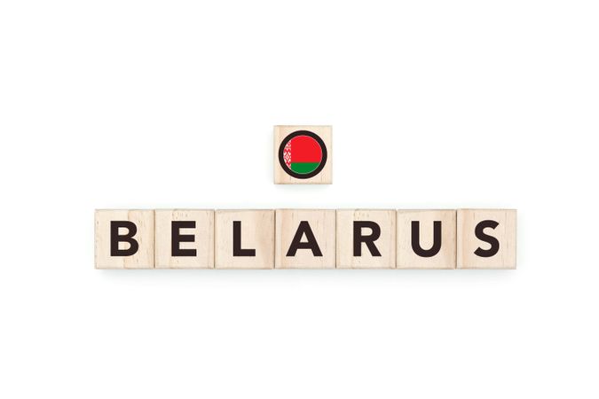 Wooden blocks bearing the name and flag of Belarus.