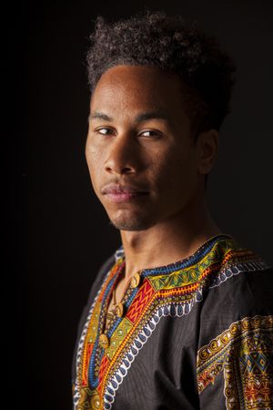 Black man looking at camera with confidence