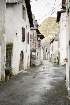 Old buildings in city near mountains