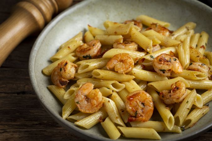 Penne pasta with grilled shrimp.