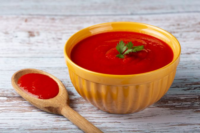 Delicious homemade tomato soup in bowl.