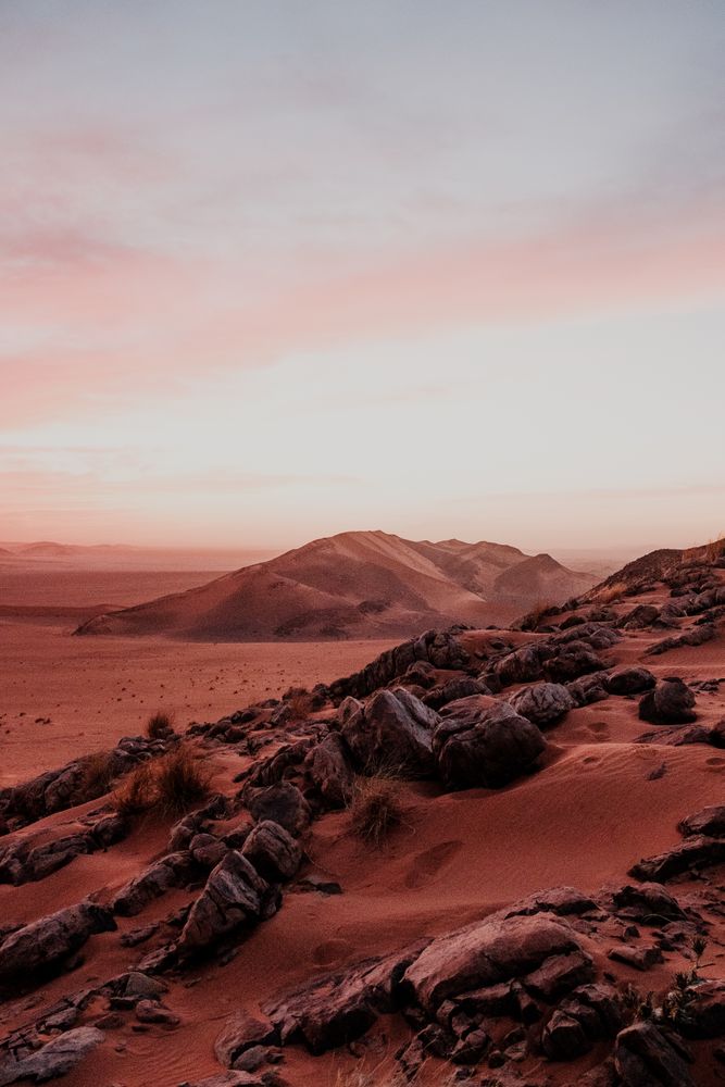 Sunset sky over hills in desert