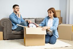 Concept of move with a happy young couple