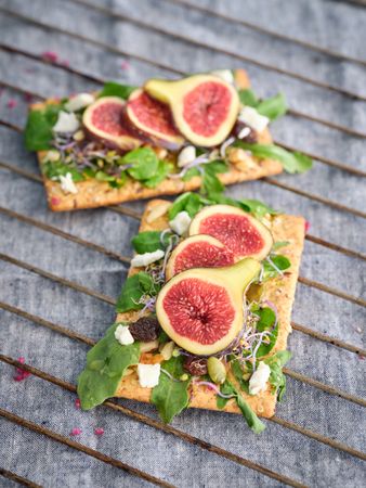 Fig slices on wooden table