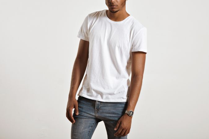 Picture of Black man in t-shirt and jeans in studio shoot