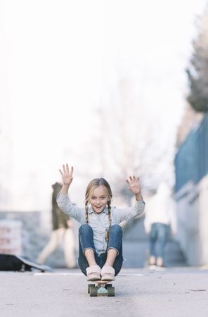 Kid playing with skateboard