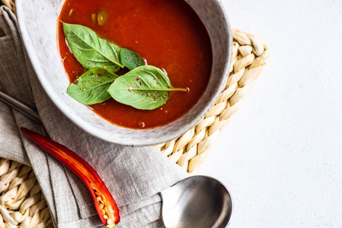 Top view of traditional Spanish soup gazpacho in ceramic bowl