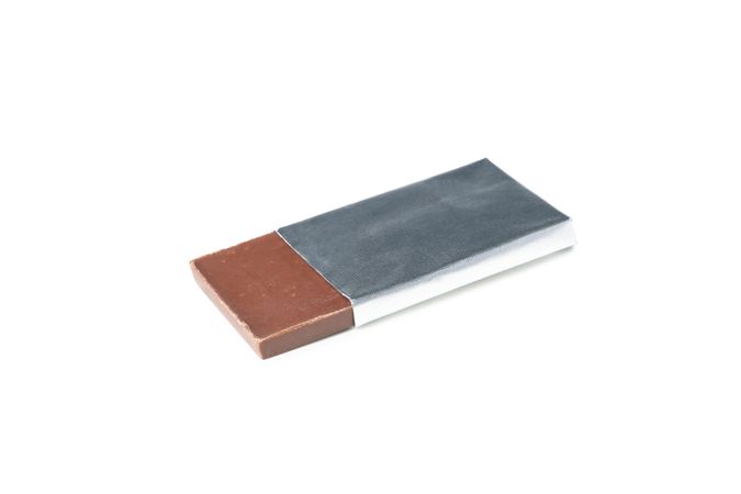 Concept of tasty food, chocolate, isolated on light background