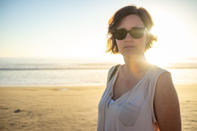 Beautiful female near waving sea