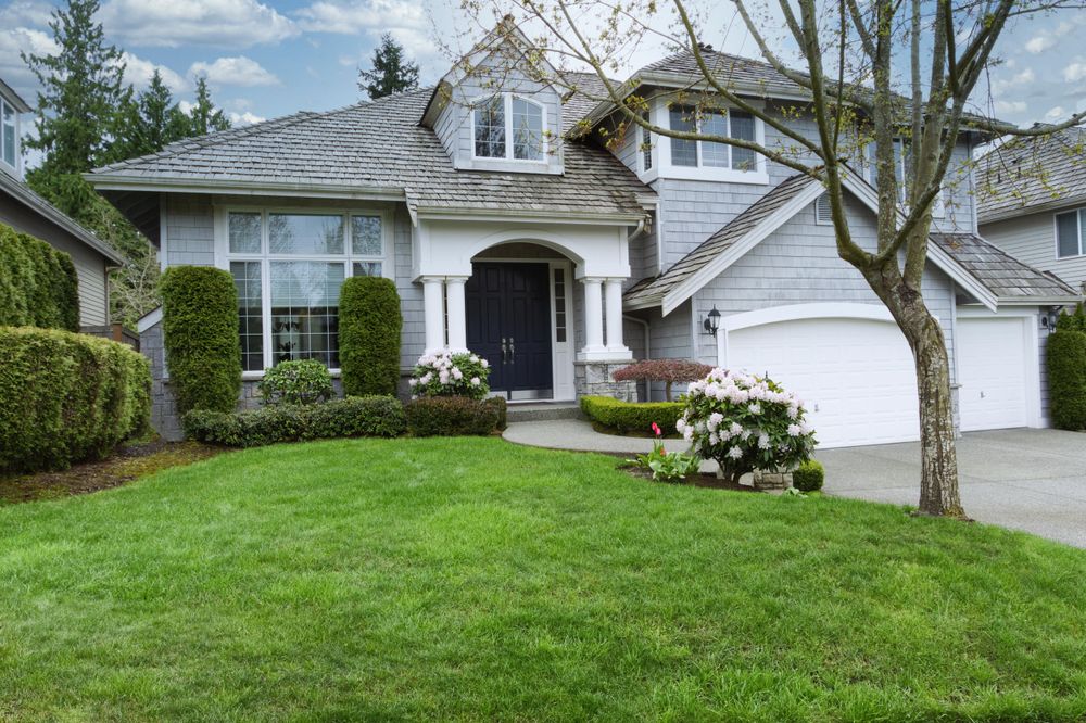 Early spring time with home and front yard