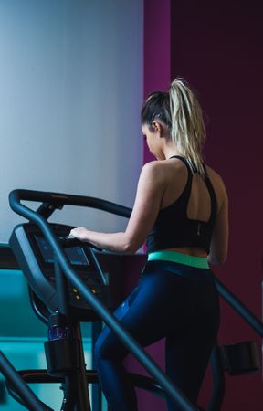 woman on exercise machine