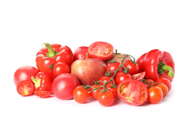 Tomatoes, apples and peppers isolated on blank background