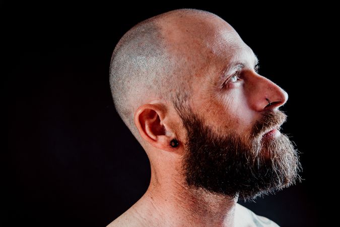Pensive adult bearded man