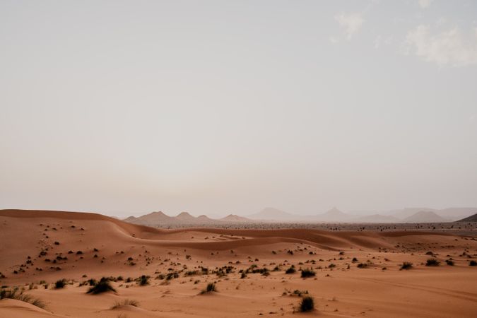 Sunset sky over hills in desert