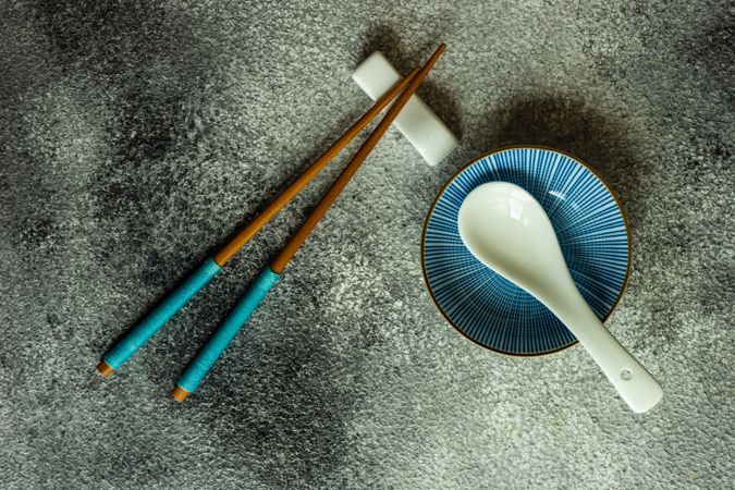 Blue Asian table setting with chopsticks