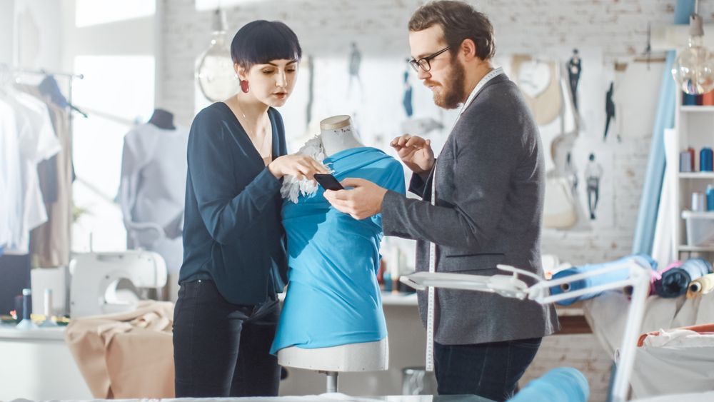 Male and Female fashion, designers are Working on Tailored Mannequin Wearing Clothes.