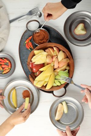 Top View Rujak Buah, Sliced Indonesian Fruit Salad, Served with Spicy Brown Sugar Sauce