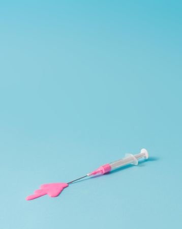Syringe with pink paint