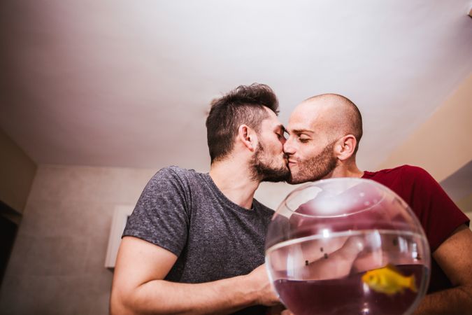 young gay couple at home