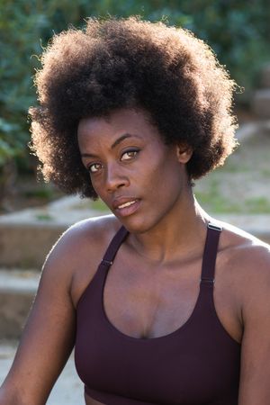 Sporty Black woman on city street