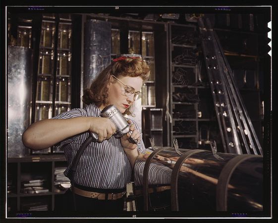 Inglewood, CA, USA - Oct 1942: Woman working in the control surface