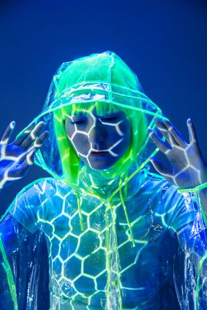 Asian woman posing in fluorescent light