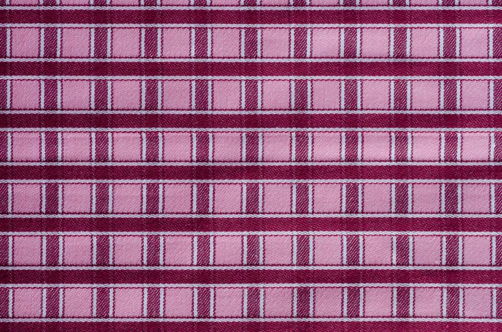 Brown fabric plaid texture. Cloth background