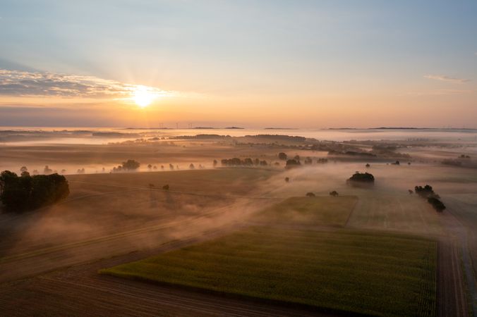 Drone aerial view of a german foggy morning in a rural scenery
