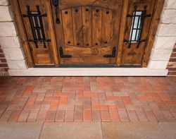 Empty Front Porch of House In Front of Custom Front Door.