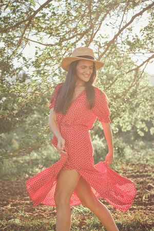 Woman in summer dress and hat