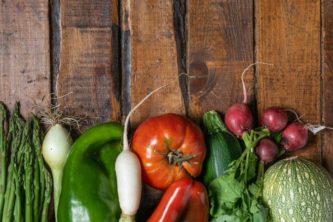 Fresh organic vegetables on a dark wooden table