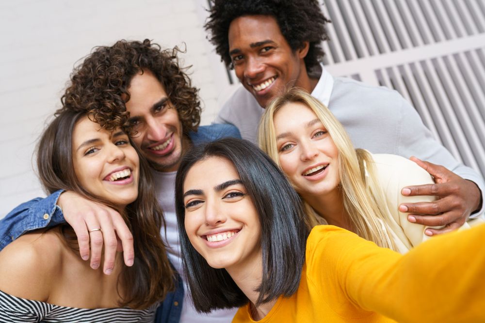 Friends posing for a selfie outside