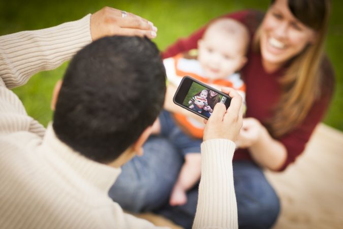 Happy Parents and Baby Boy Taking Self Portraits