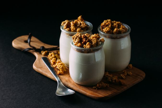 Glass bottles with milk and walnuts
