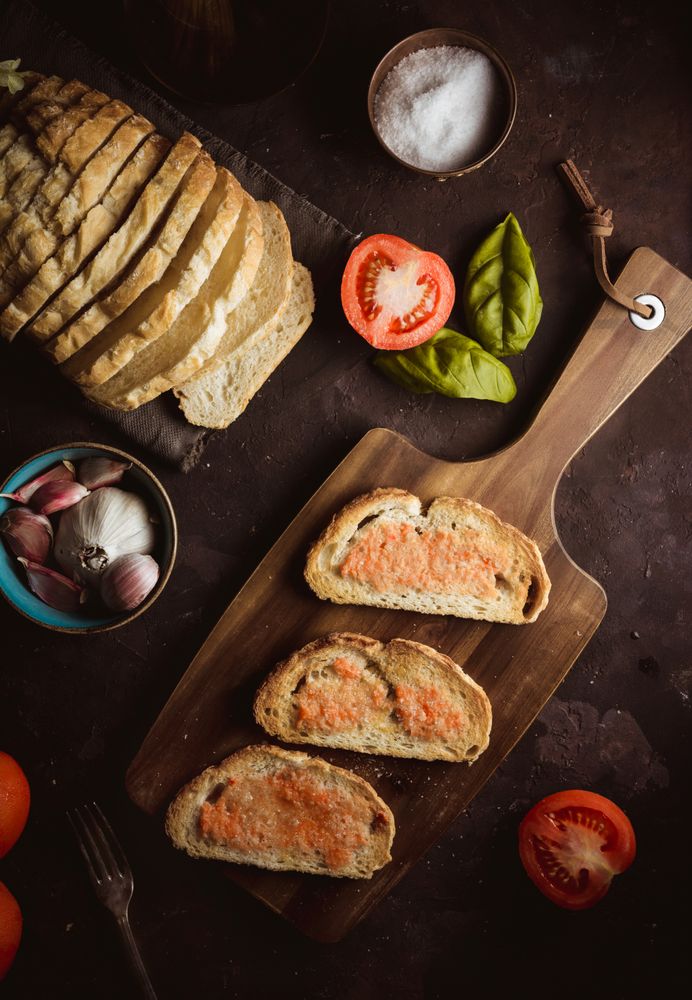 Spices and vegetables near toasts