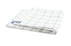 Folded fabric napkin isolated on plain background