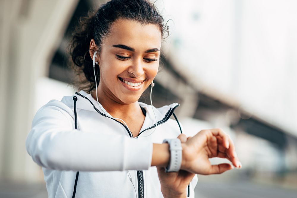 Close up of woman looking at her smartwatch