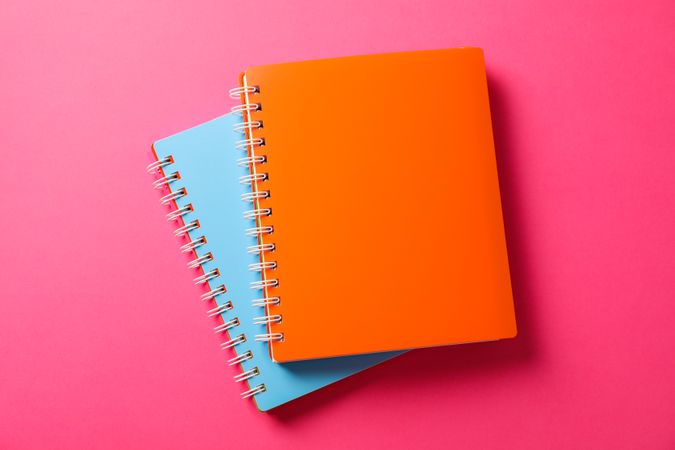 School copybooks on color background, space for text