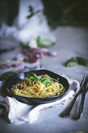 Delicious noodles served with green and vegetable