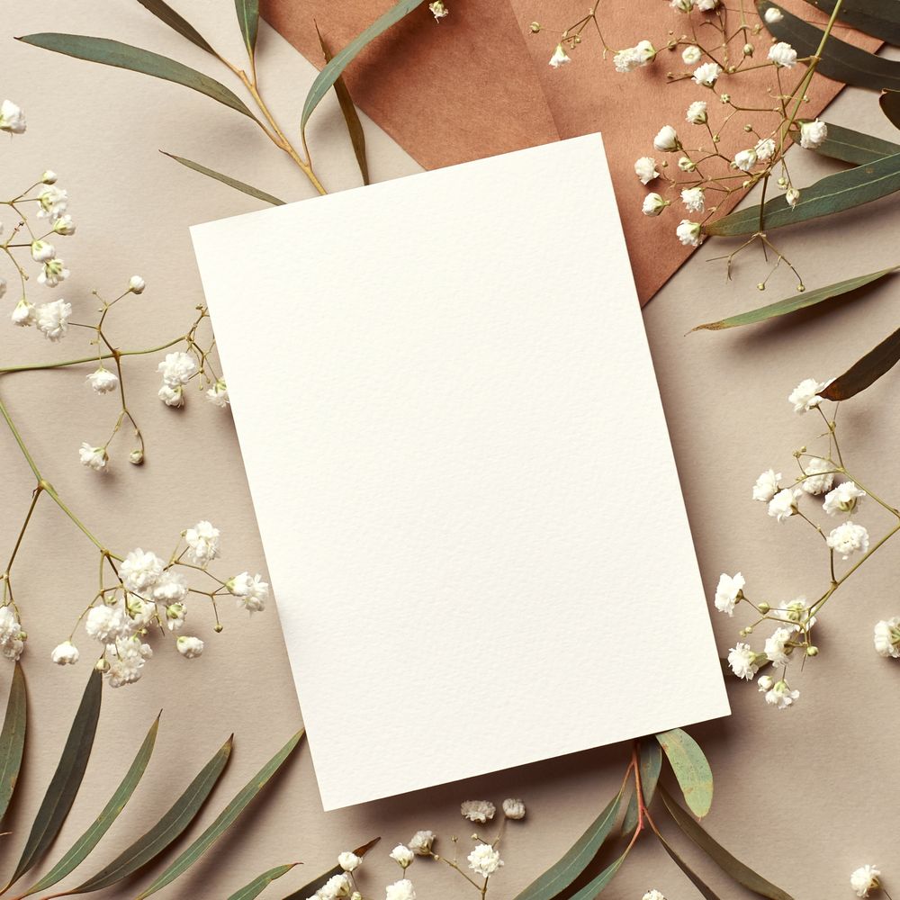 paper with dried leaves and flowers