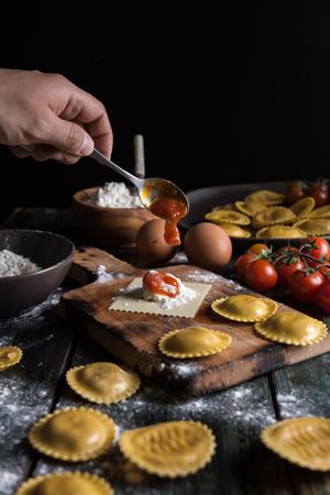 Homemade ravioli made with parmesan cheese, tomato and basil.