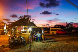 Bali, Indonesia - Feb 26, 2018 - Sunset in a parking lot in Bali