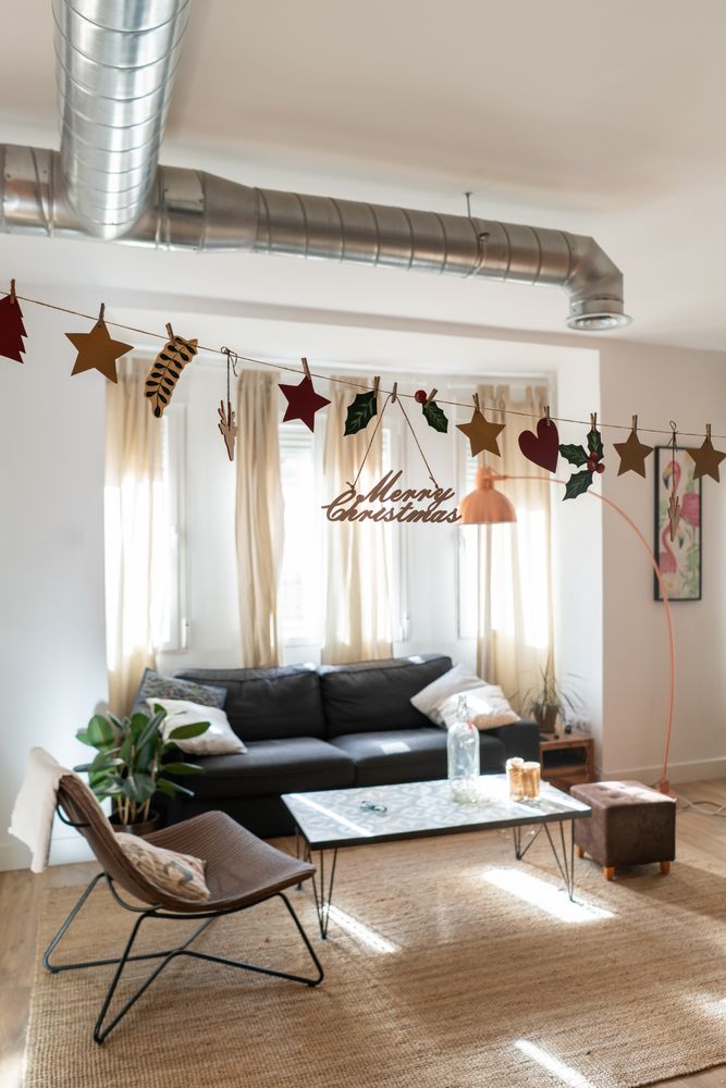 Light modern room decorated for Christmas