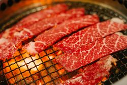 Beef being grilled in Japanese Yakiniku grill